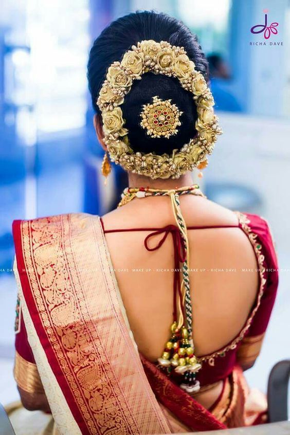 4.Bun Hairstyle with gold rose Gajra