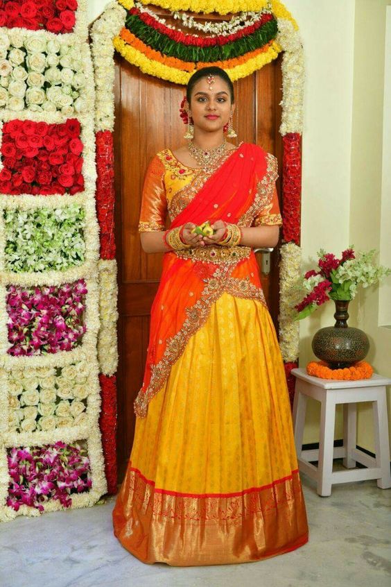 36.Yellow with red bridal half saree