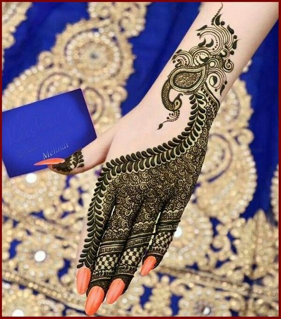 40.Back hand design with Peacock Mehndi 