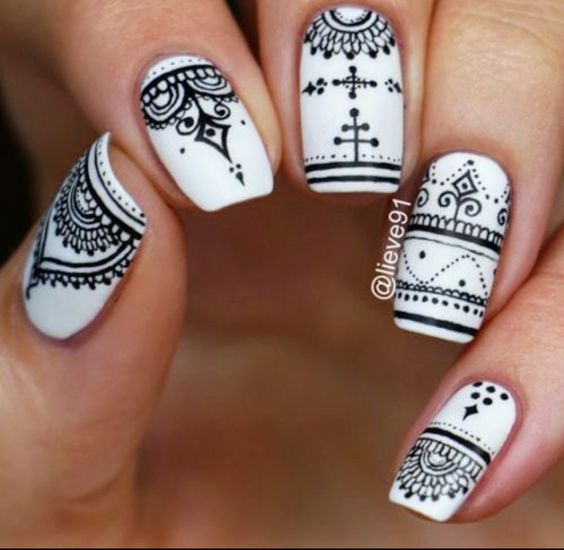 20.Mehndi design black and white nail art 