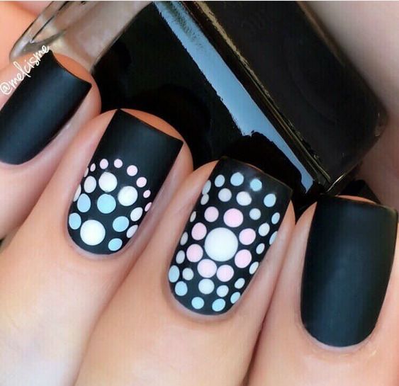 50.Round dotted Black and white nail art 