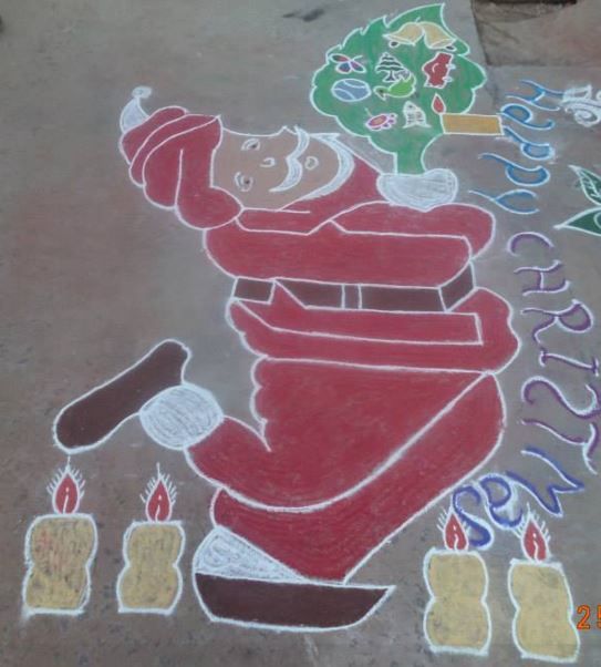 19.santa holding christmas tree rangoli 