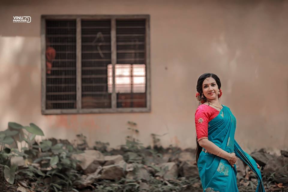 Admiring blue Saree  