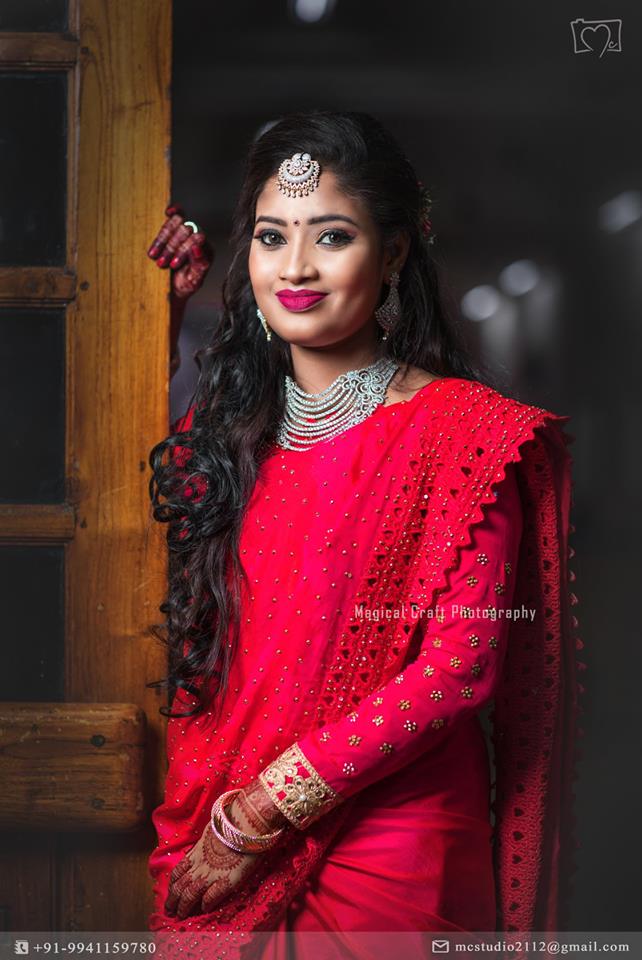 Dashing red bridal designer saree