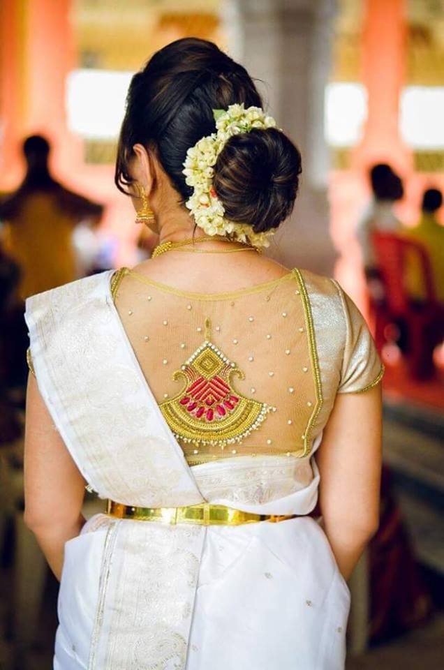 Elegant White saree with Golden Net Blouse 