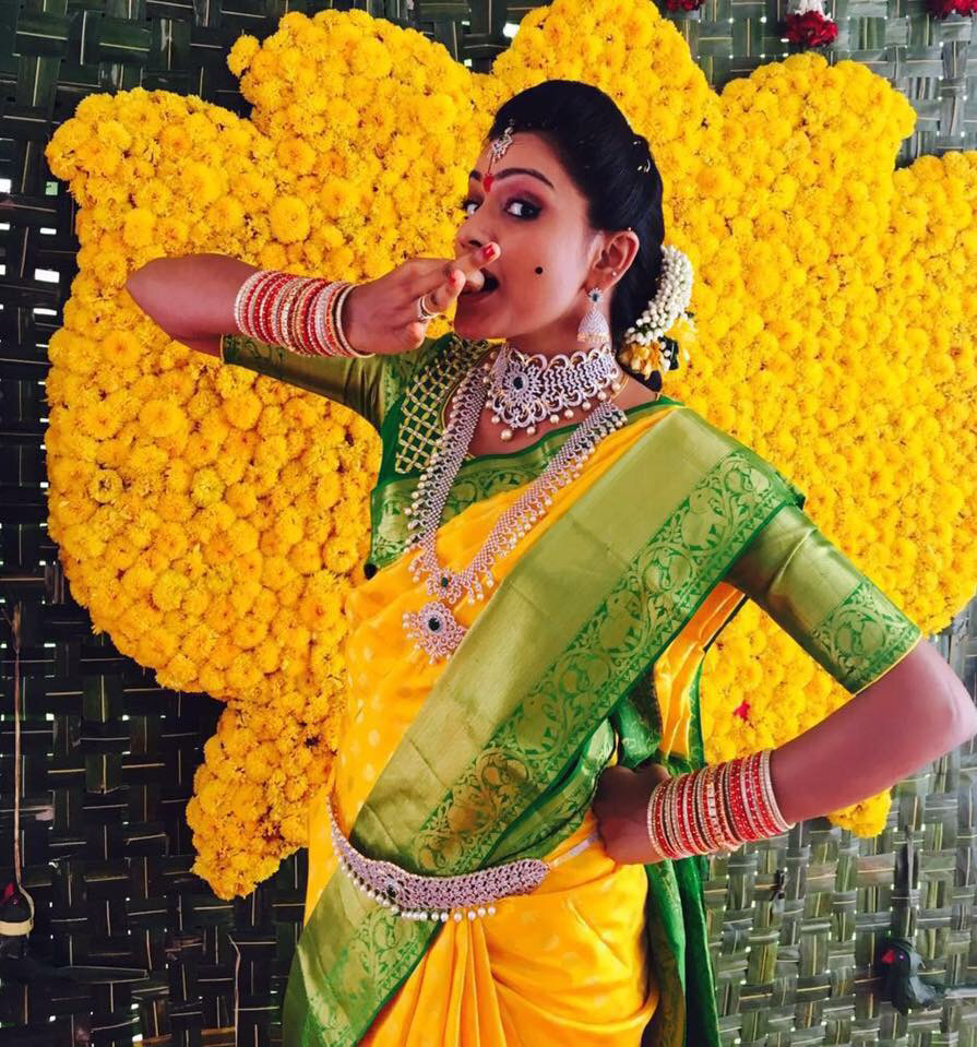 Yellow Kancipuram silk saree with Green Border