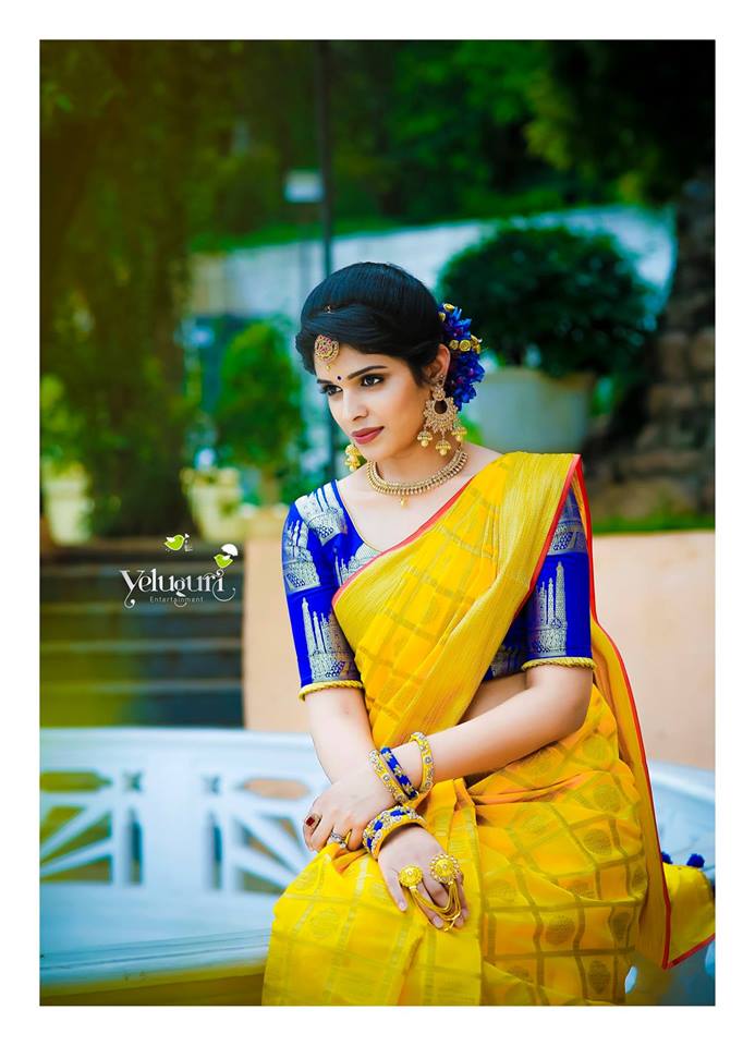 Yellow silk saree with royal blue blouse