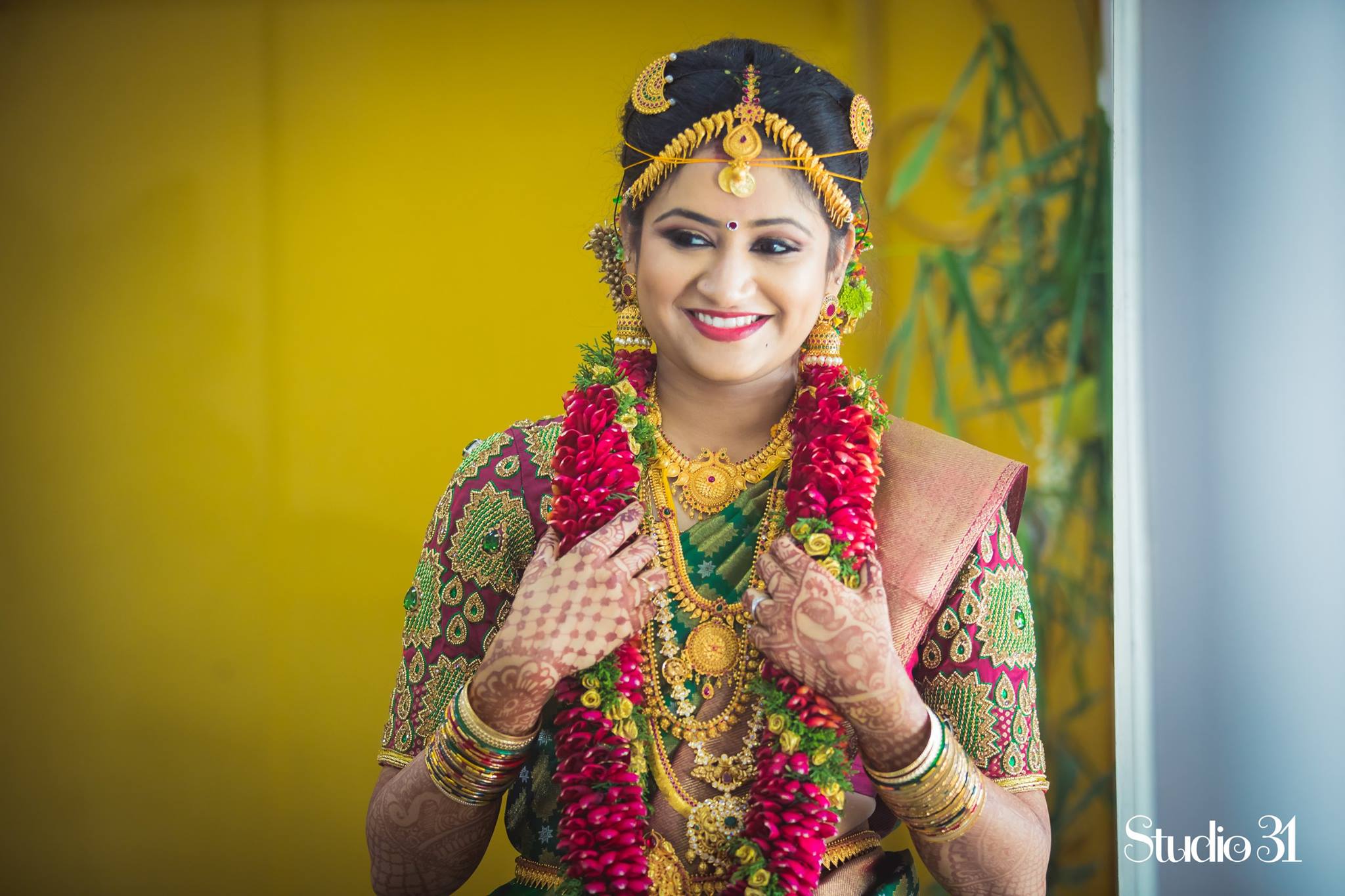 Maroon Blouse with Green Aari Work