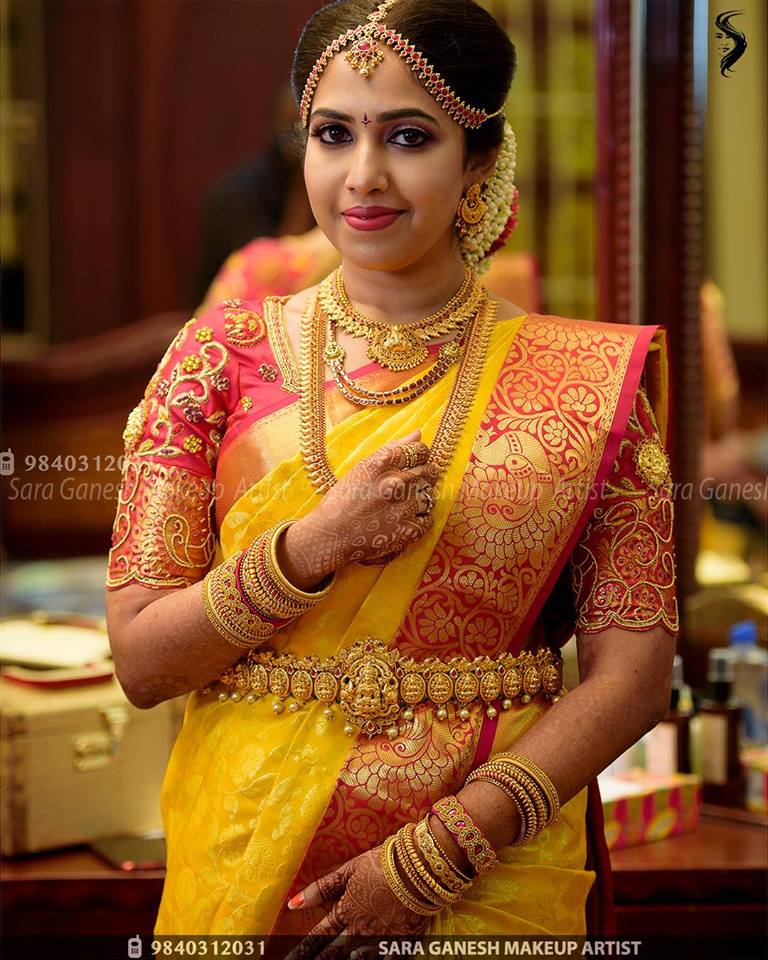 Yellow with Red peacock border silksaree
