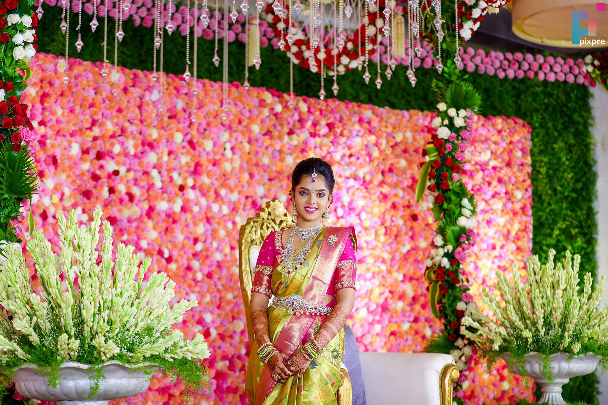 Yellow silk saree with golden pink border