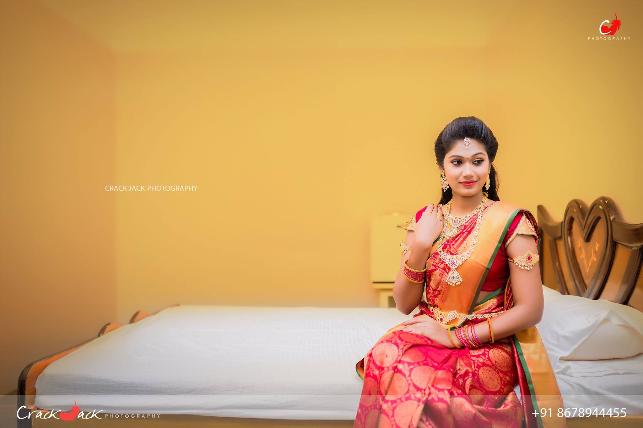 Red silk saree with round gold prints