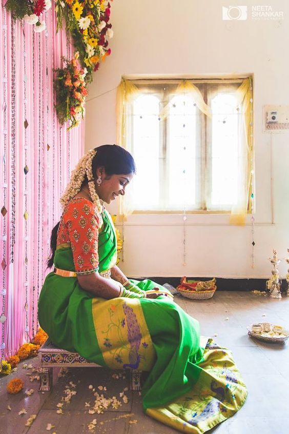 Graceful Green saree with orange aari work blouse