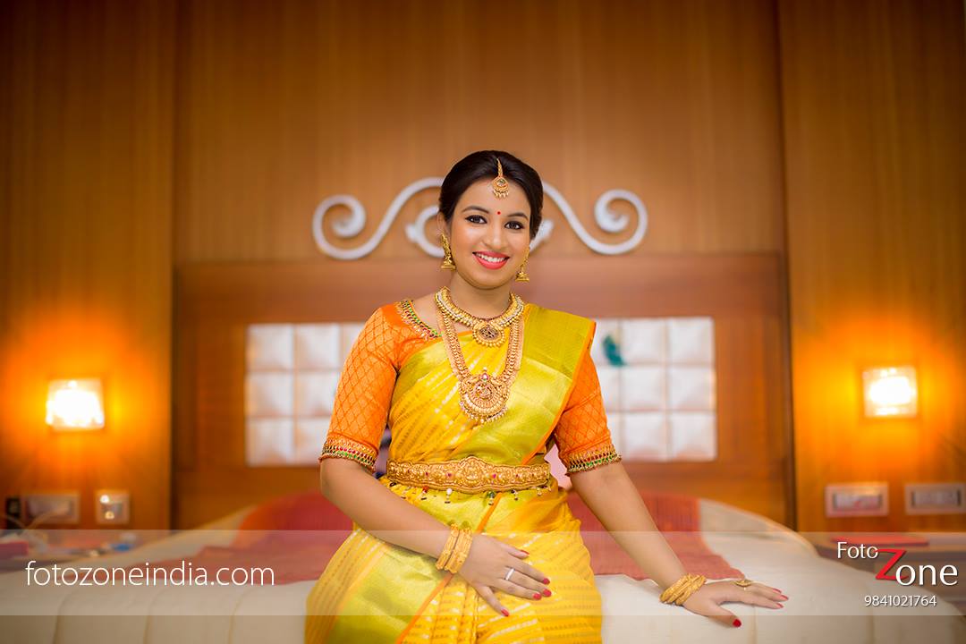 Yellow saree with Orange Blouse