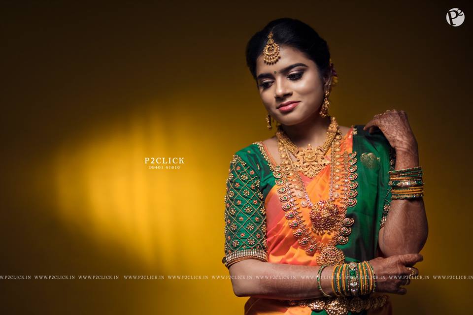 Orange silksaree with green border 