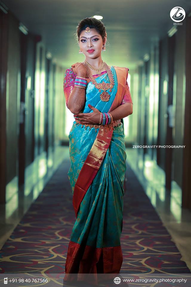 Blue kancivaram Silk saree with pink border