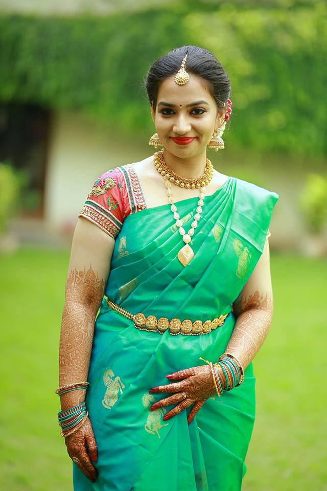 green silksaree with red blouse