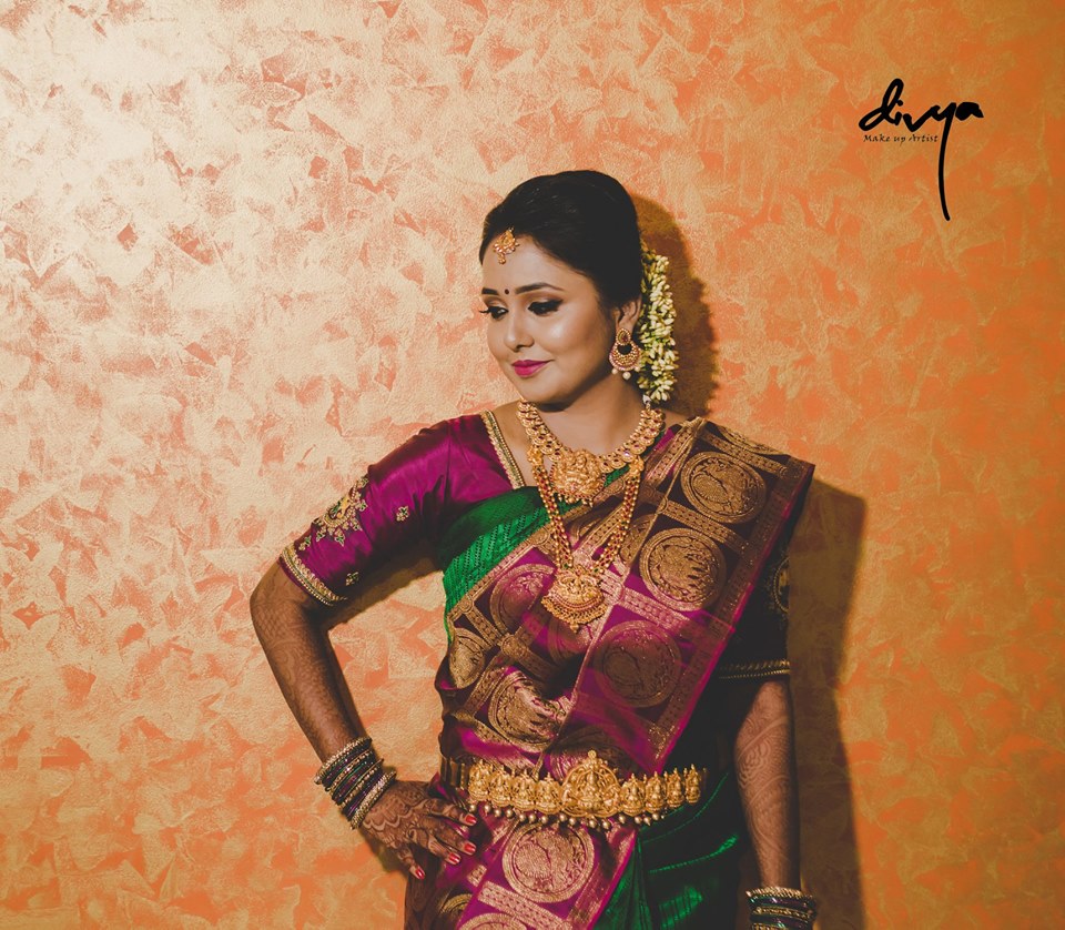 Green silksaree with Big Violet Border