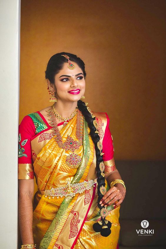 Yellow silksaree with green and red border