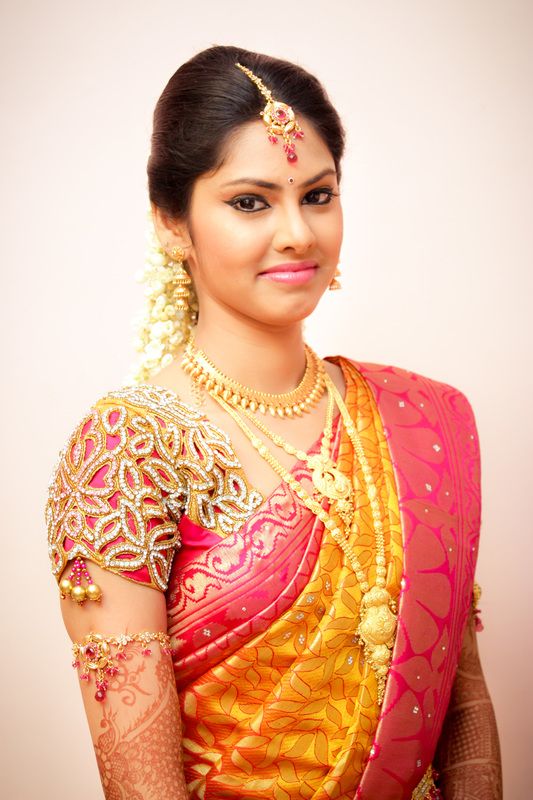 Yellow saree with elegant cut work pink blouse
