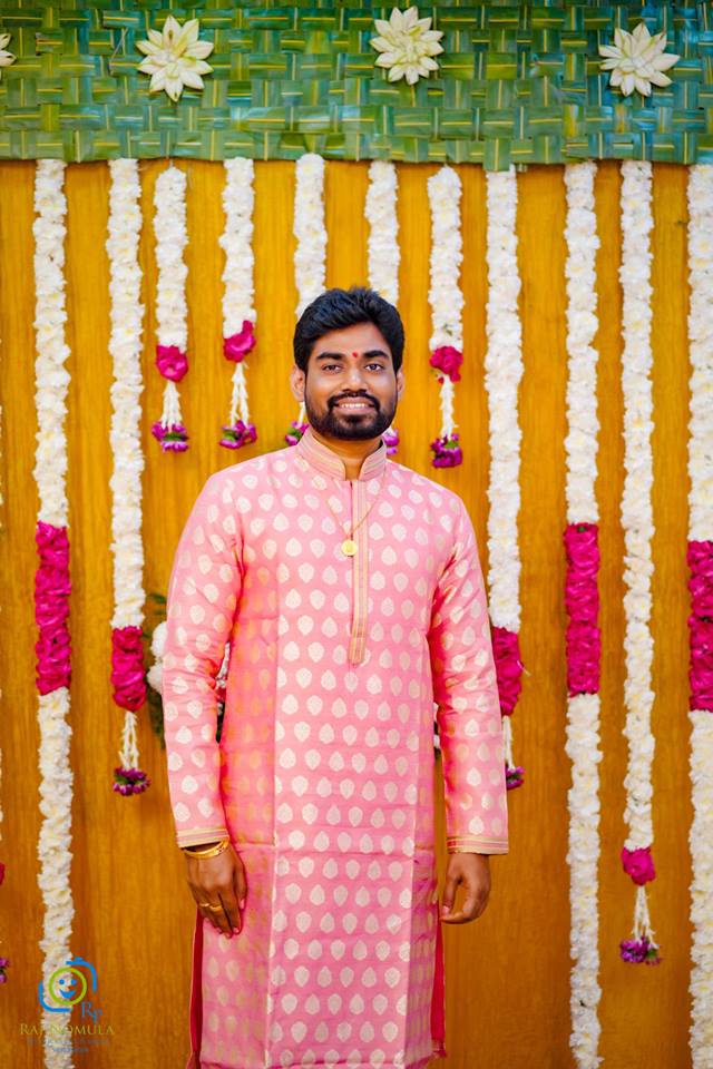 Pink sherwani with gold butta's