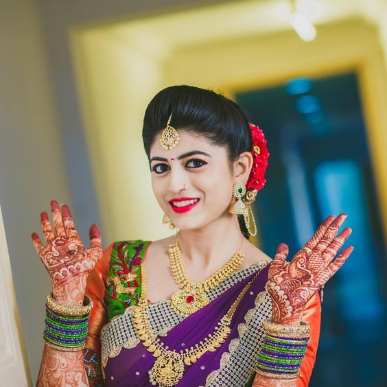 Bridal mehndi for violet saree bride