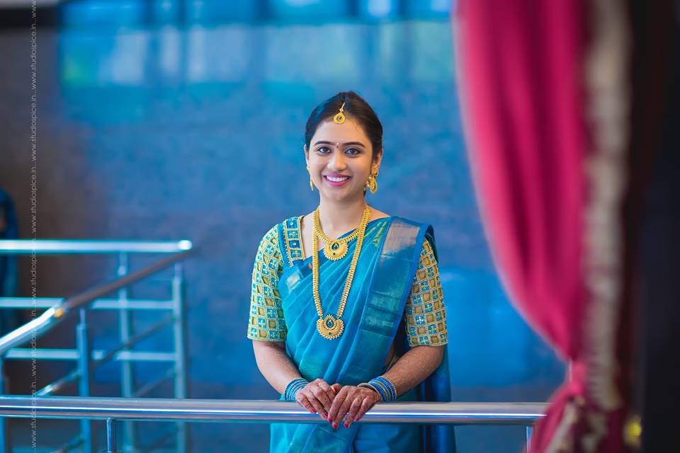 Bride in pretty blue silksaree