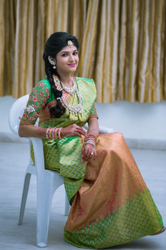 Orange Silk saree with Green waves border