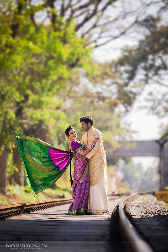 Violet silk saree with dark green border