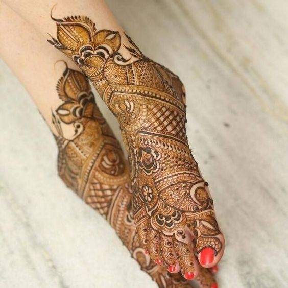 Feet mehndi red nail polish