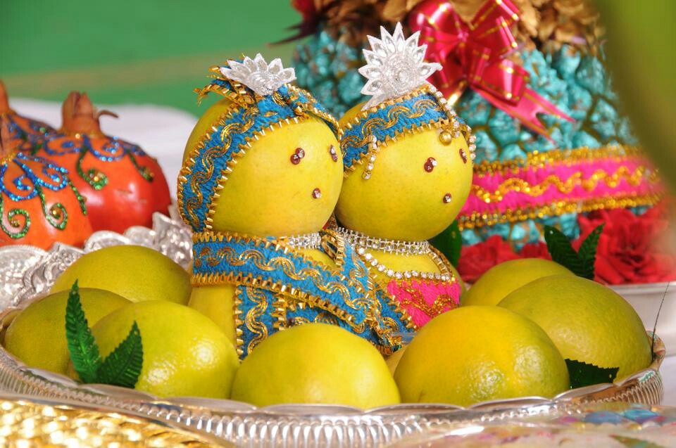 Bride and Groom Decorated in orange fruit