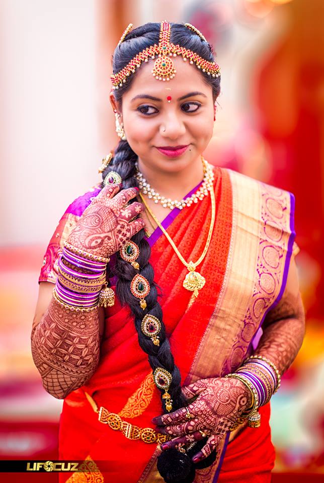 Orange silksaree with pretty purple border