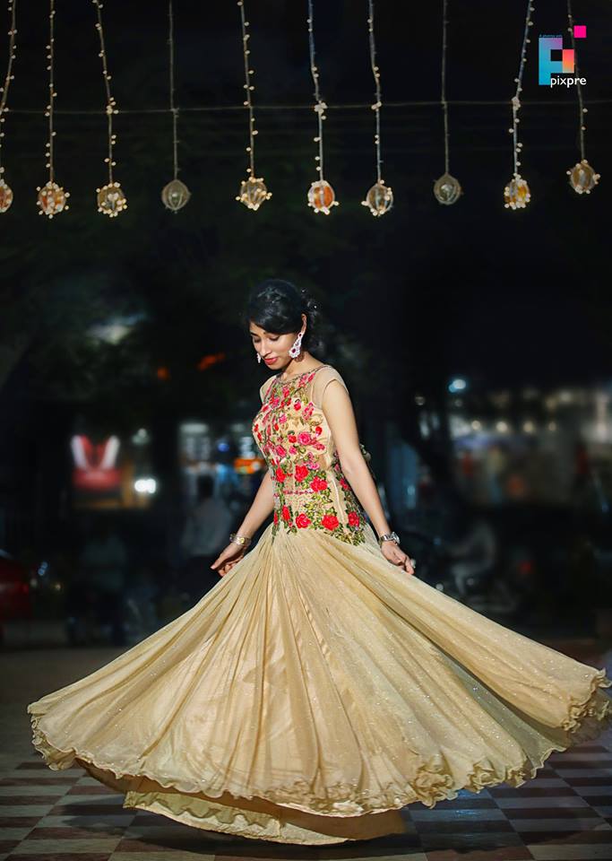 Beige designer Gown with flowers