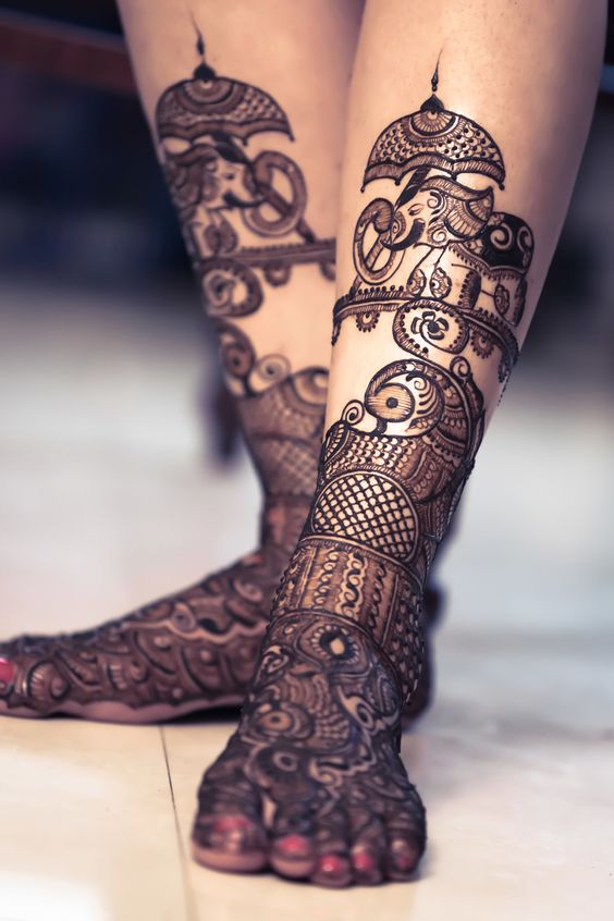 Elephant and peacock design feet mehndi 