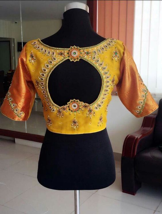 yellow flower back neck blouse design 