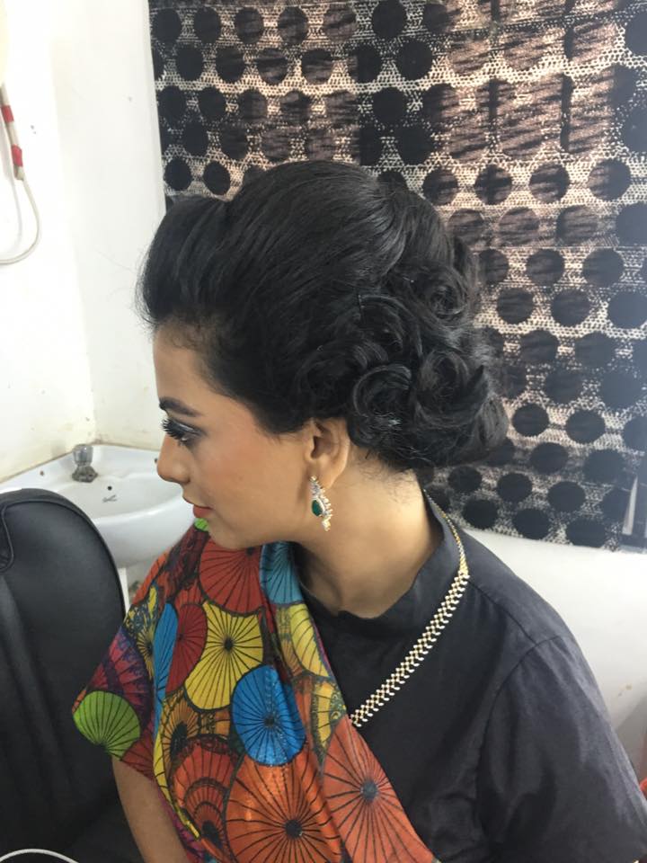 Spiral Bun Hairstlye for Black Lehenga