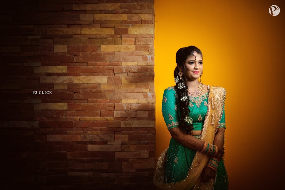 pista green with golden lehnga