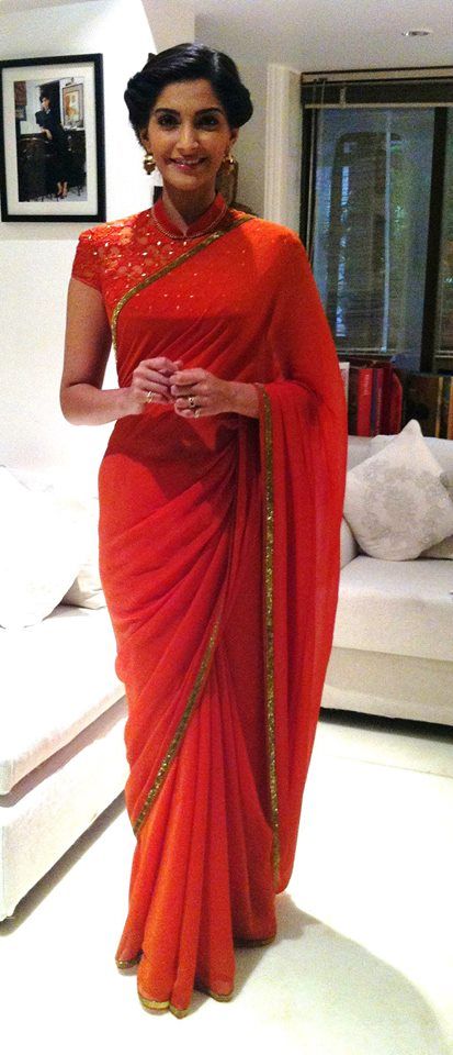 Plain Orange with Gold Border Saree