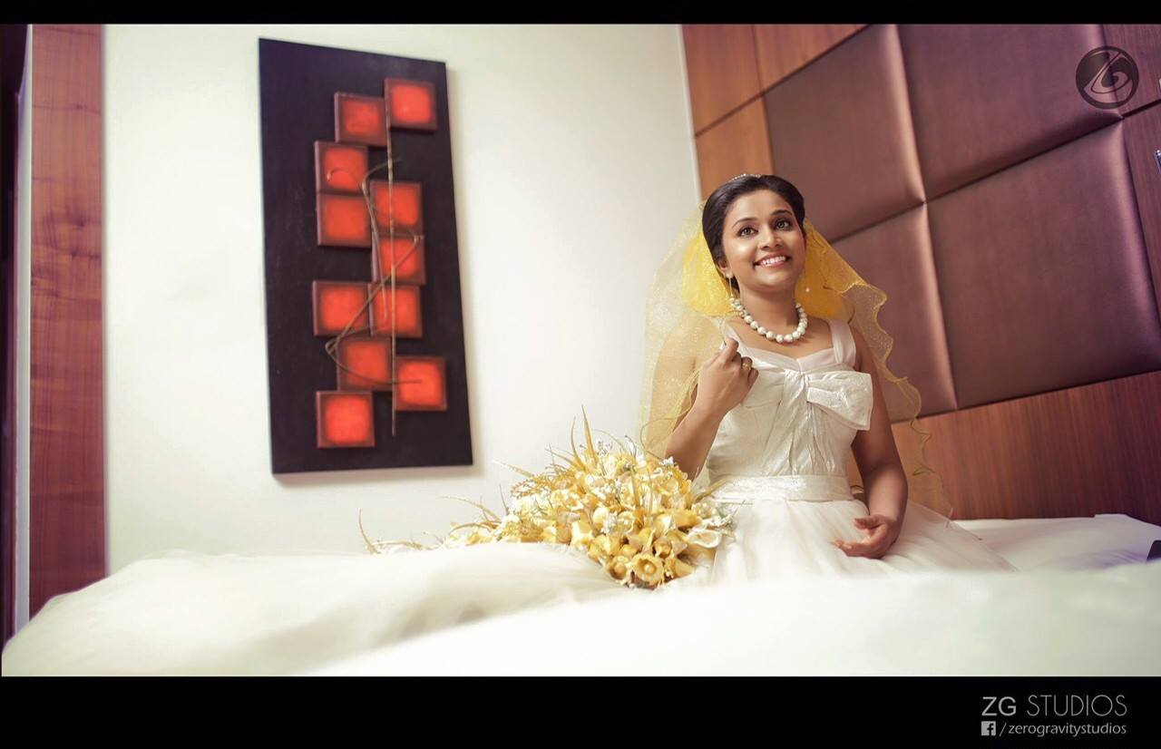 White Gown Christian Bride with Golden Bouquet