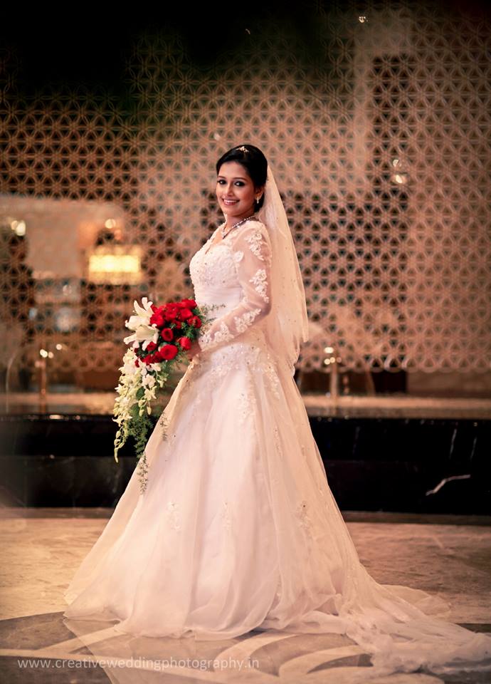 Pretty white gown bride with bouquet