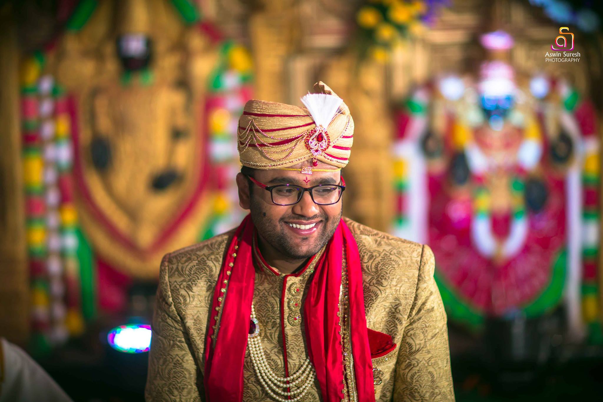 Golden sherwani with red shall and turban