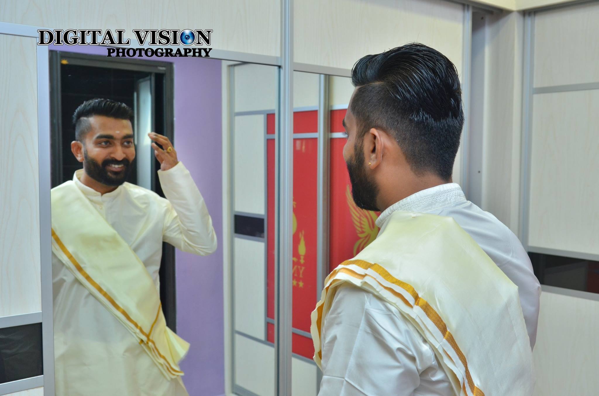 White traditional Groom outfit