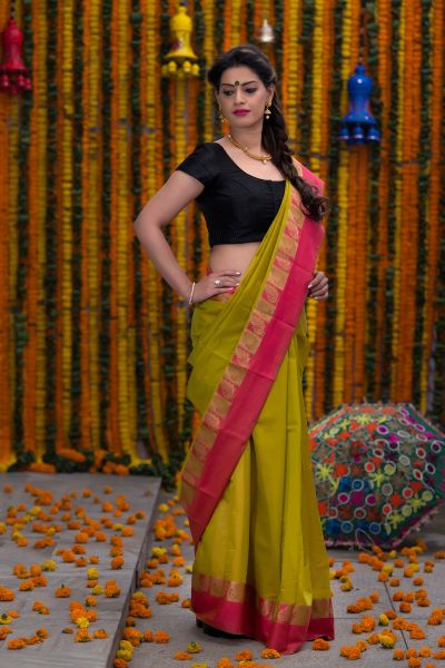 Green saree with pink border 