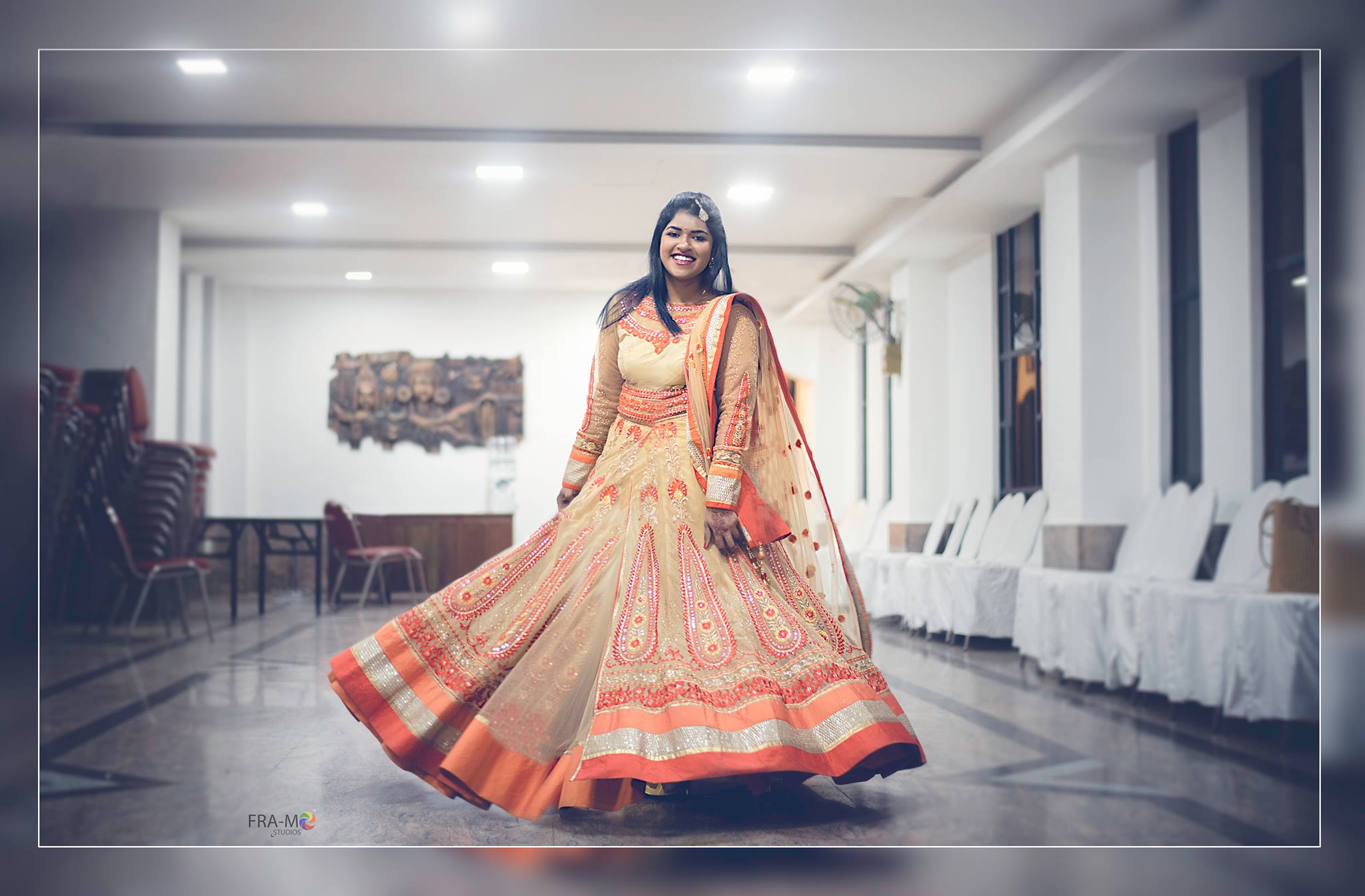 Orange with gold color bridal lehenga